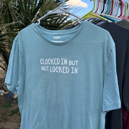 CLOCKED IN BUT NOT LOCKED IN | T-SHIRT